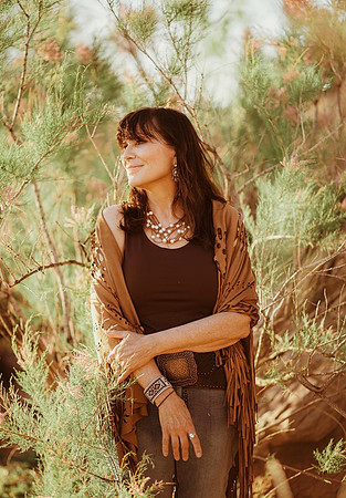 Carol standing in tree